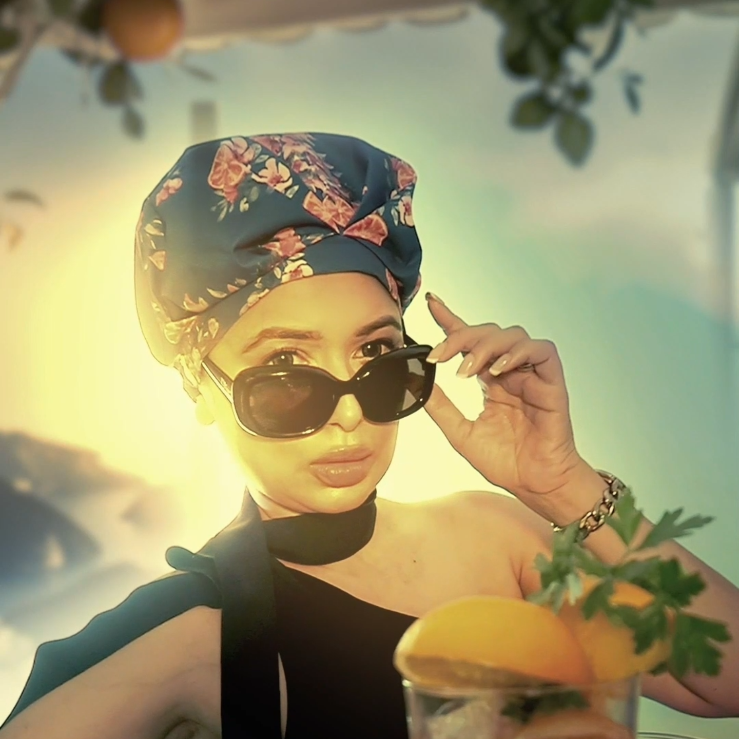 Lady wearing a Musea Mane Shower cap called Amalfi.